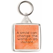A smile can change the world in an instant. - Square Keyring